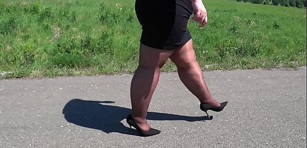  Mature BBW in nylon pantyhose and high heels walks down the public road Foot fetish Big booty ASMR